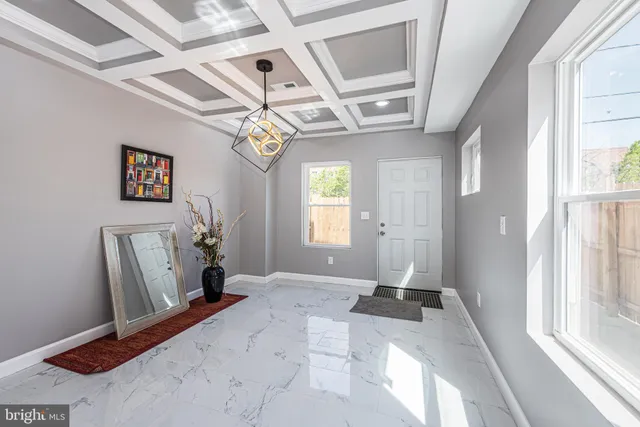 a view of a hallway with windows