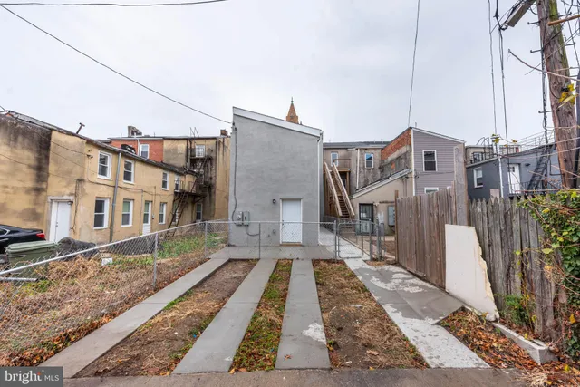 a view of a building with a street