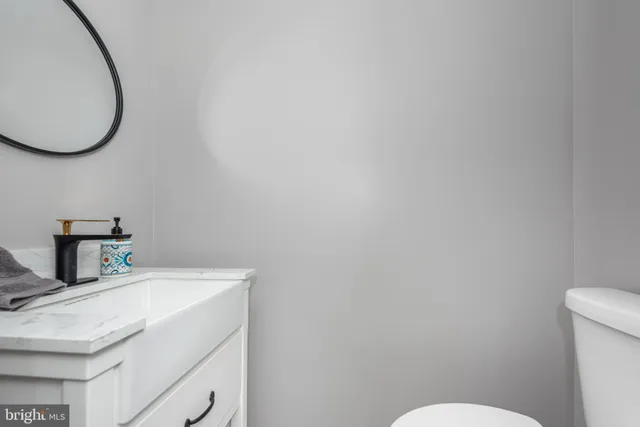 a bathroom with a sink and a toilet