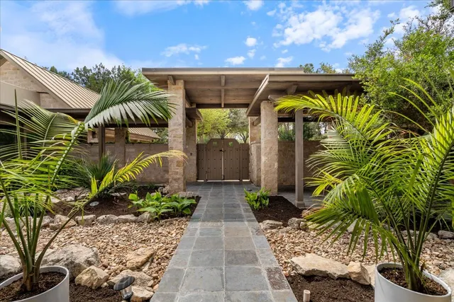 a view of a living room a livingroom with furniture and a fireplace