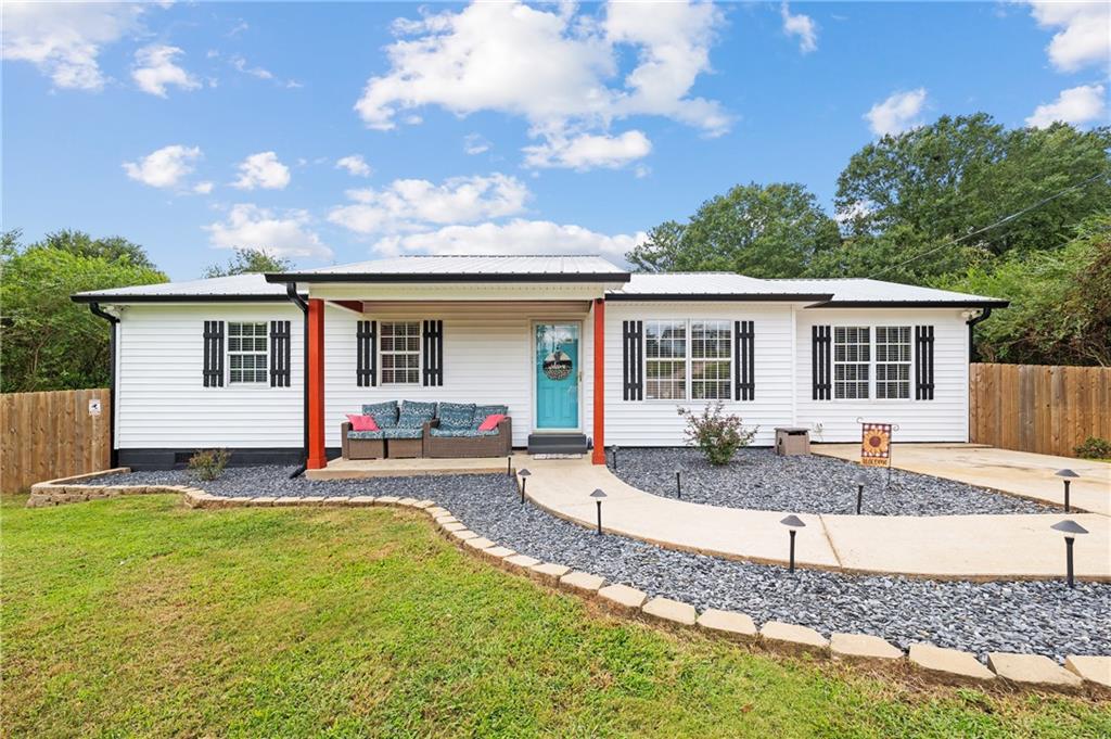 3118 Fork Road Gainesville, GA 30506 - Photo 1 of 1 a front view of a house with a patio