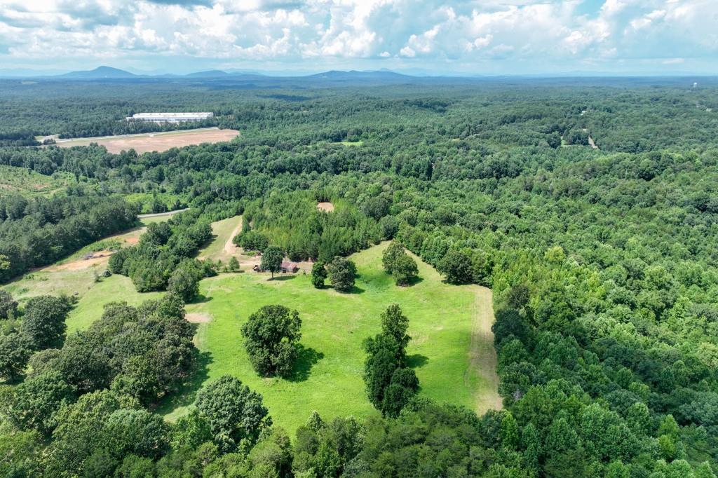 4854 Cagle Mill Road Lula, GA 30554 - Photo 16 of 20 an aerial view of houses with yard