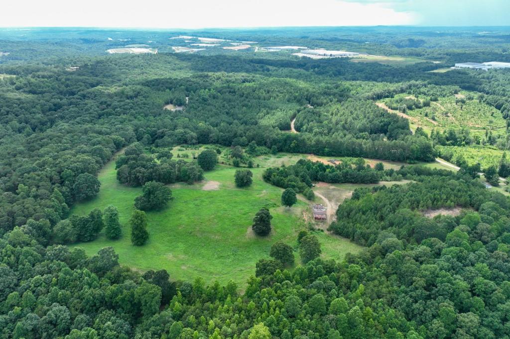4854 Cagle Mill Road Lula, GA 30554 - Photo 18 of 20 an aerial view of residential houses with outdoor space and trees