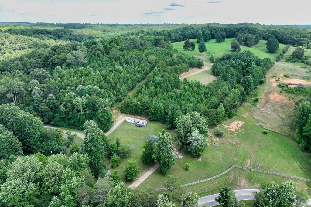 4854 Cagle Mill Road Lula, GA 30554 - Photo 8 of 20 an aerial view of residential house with outdoor space and trees all around