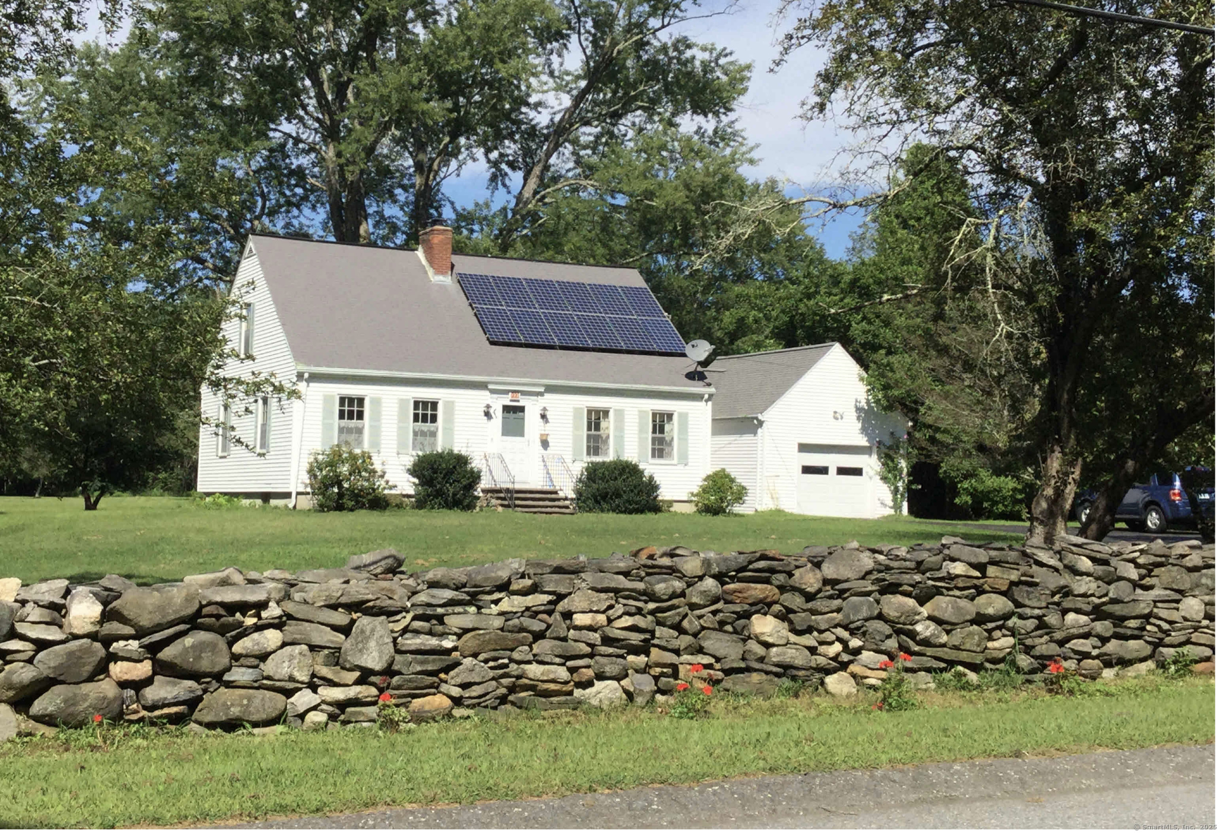 208 Heritage Road Putnam, CT 06260 - Photo 1 of 1 a view of a house with a yard