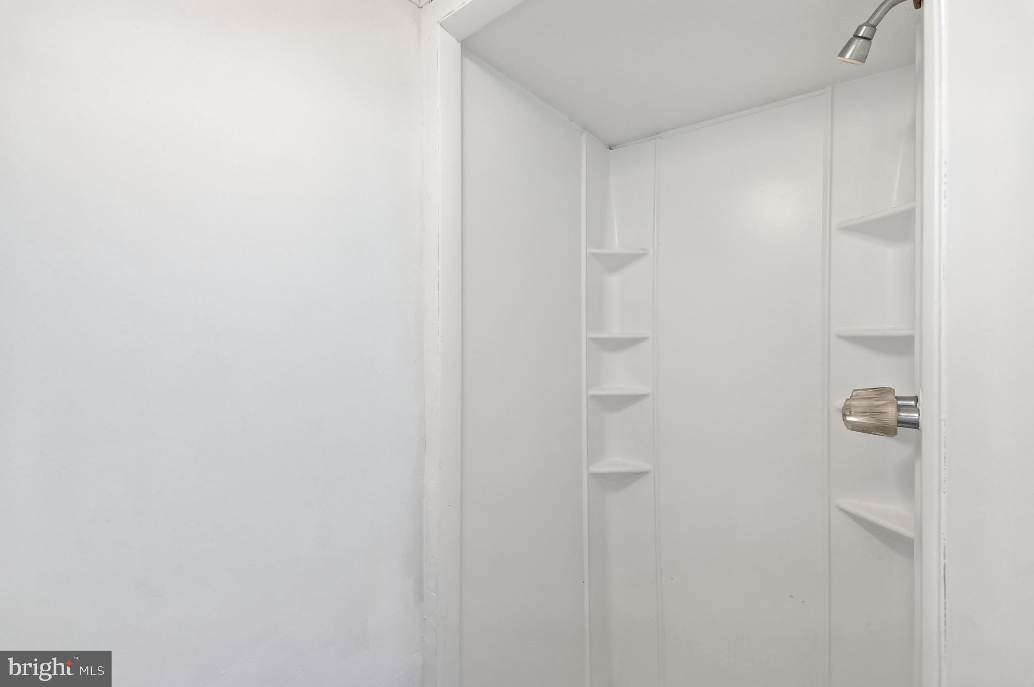 705 Tolna Street Baltimore, MD 21224 - Photo 13 of 34 a bathroom with a shower