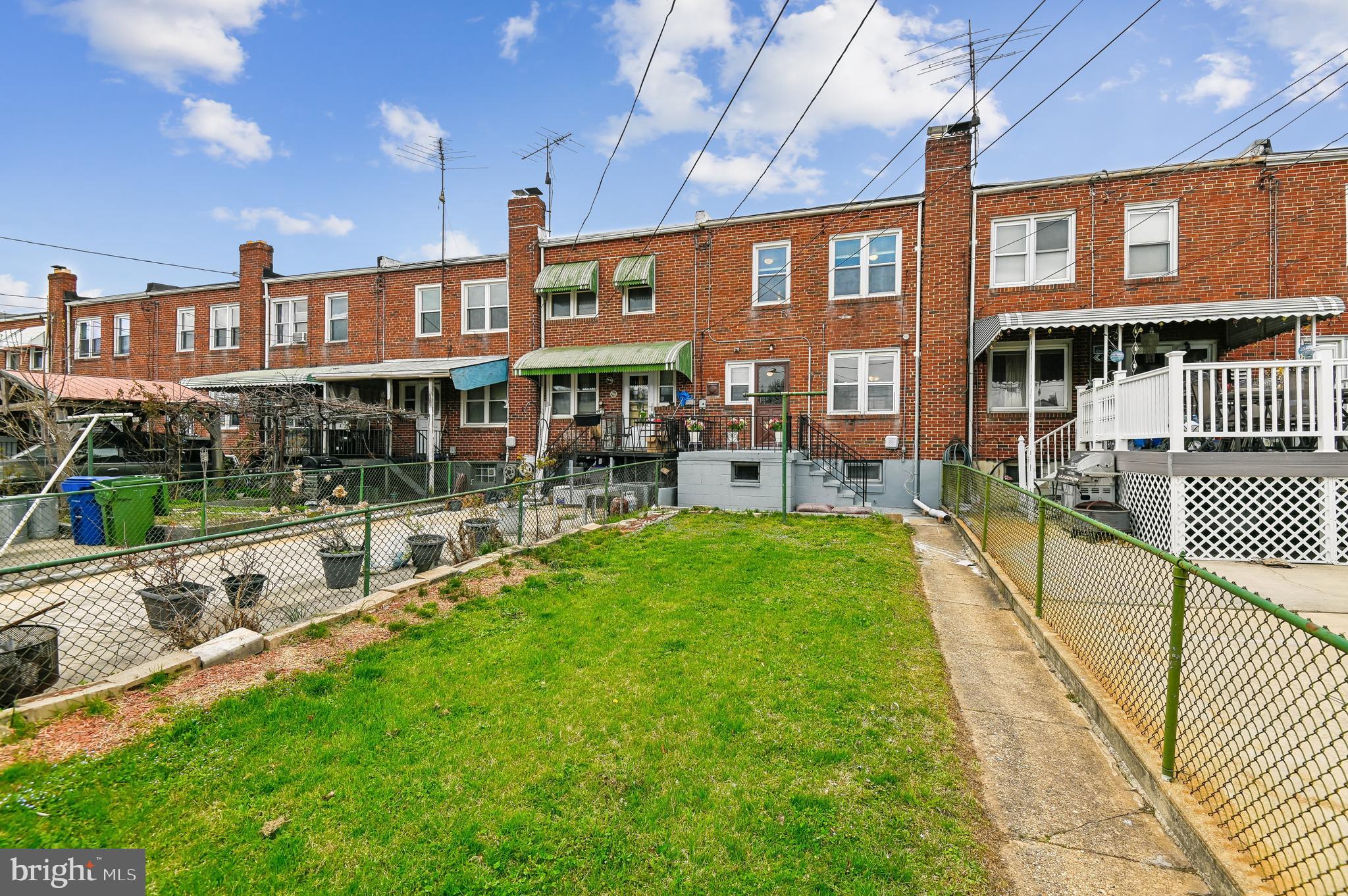 705 Tolna Street Baltimore, MD 21224 - Photo 26 of 34 a view of a house with a yard