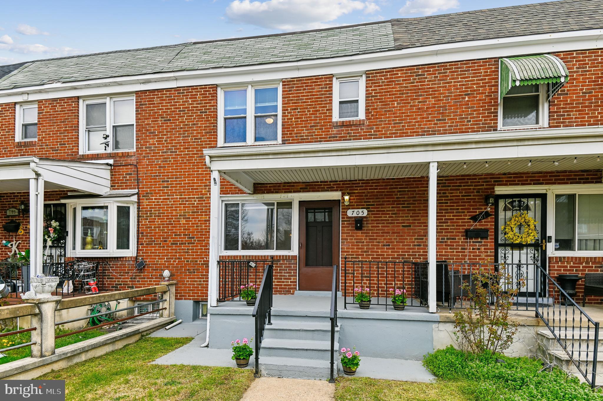 705 Tolna Street Baltimore, MD 21224 - Photo 32 of 34 front view of house with a patio