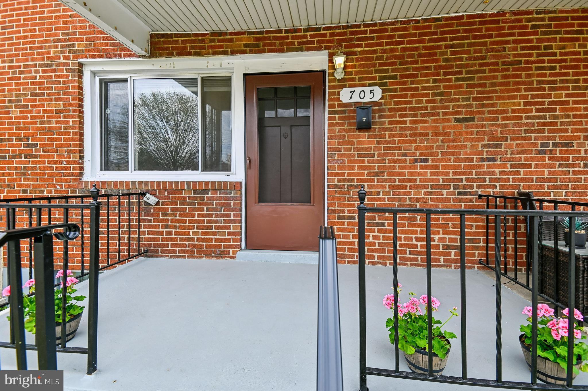 705 Tolna Street Baltimore, MD 21224 - Photo 34 of 34 a front view of a house with a garage