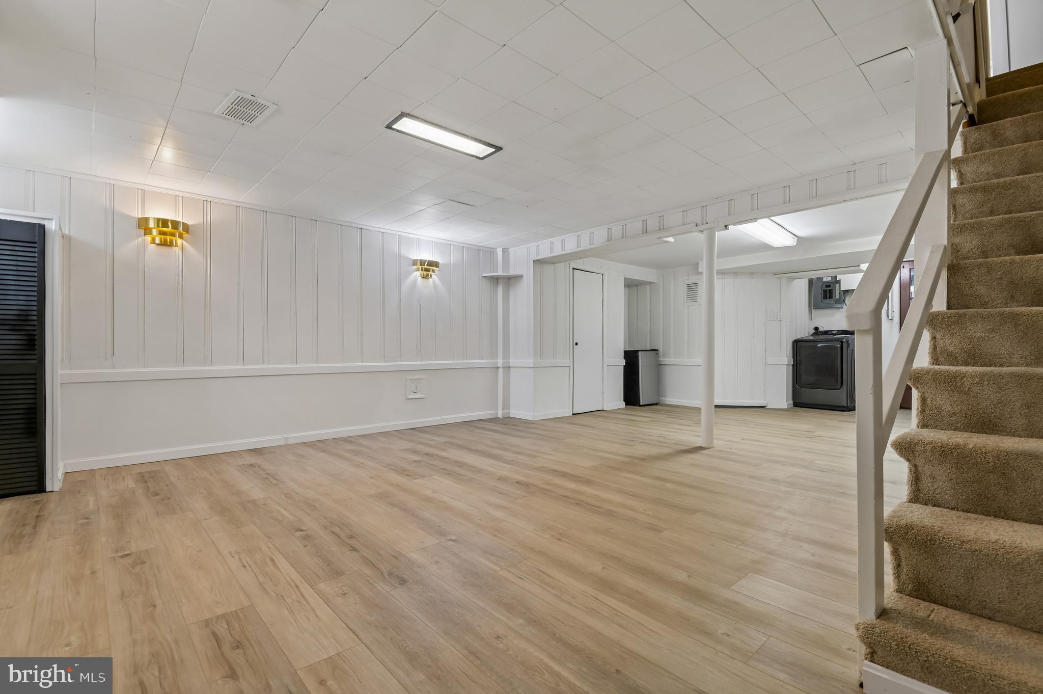 705 Tolna Street Baltimore, MD 21224 - Photo 9 of 34 a view of an empty room with wooden floor