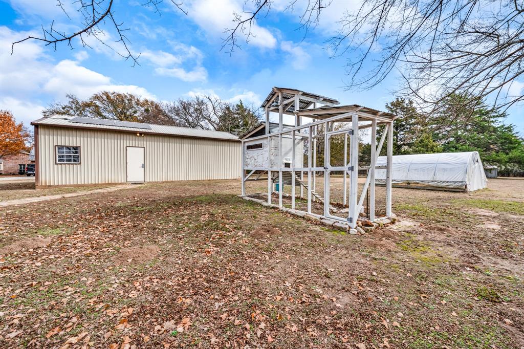 10471 Holly Creek Road Terrell, TX 75160 - Photo 32 of 40 front view of a house with a yard