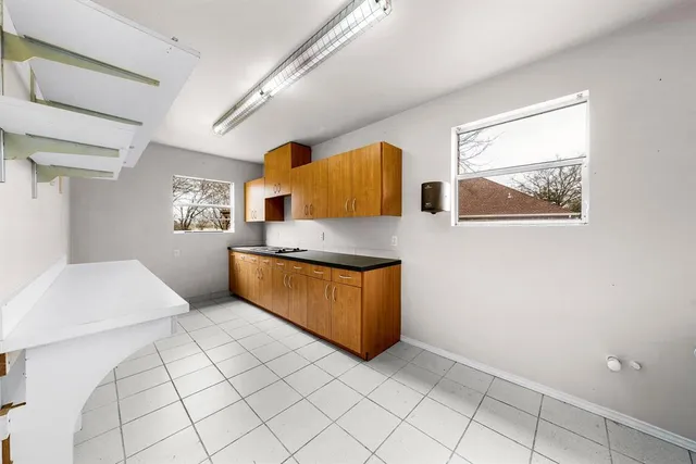 a view of a swimming pool with a yard