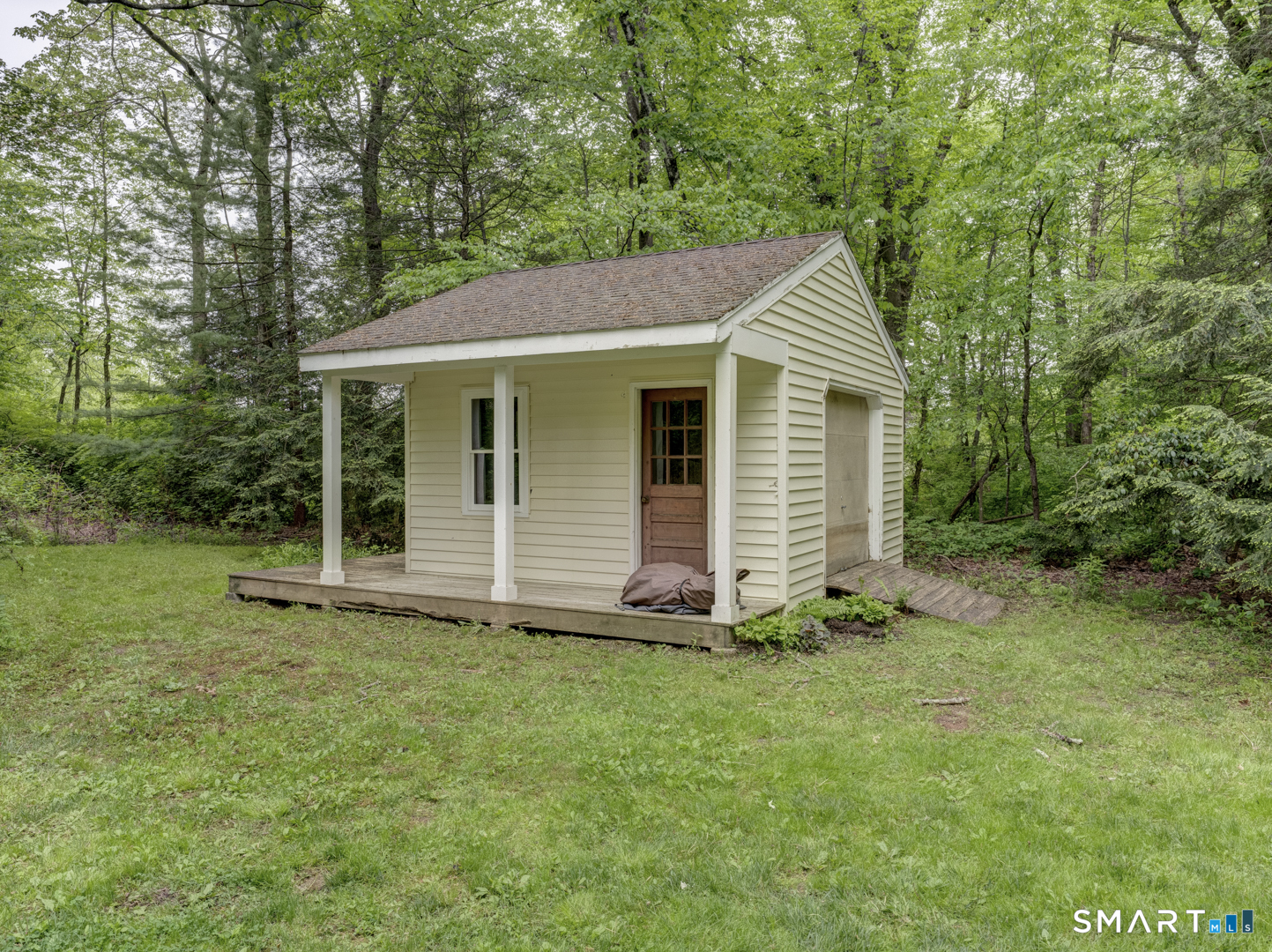 78 Windtree Street Torrington, CT 06790 - Photo 39 of 40 a view of a house with a yard
