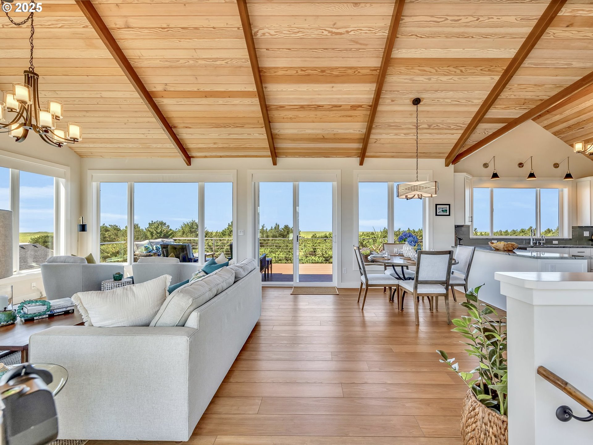 90043 Ocean Drive Warrenton, OR 97146 - Photo 13 of 48 a living room with furniture and a large window