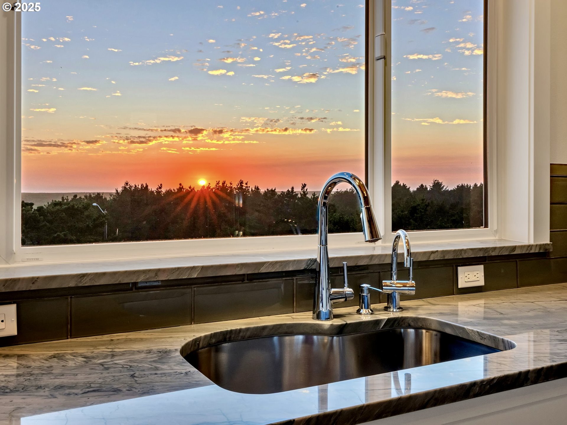 90043 Ocean Drive Warrenton, OR 97146 - Photo 24 of 48 a view of a sink and table in kitchen