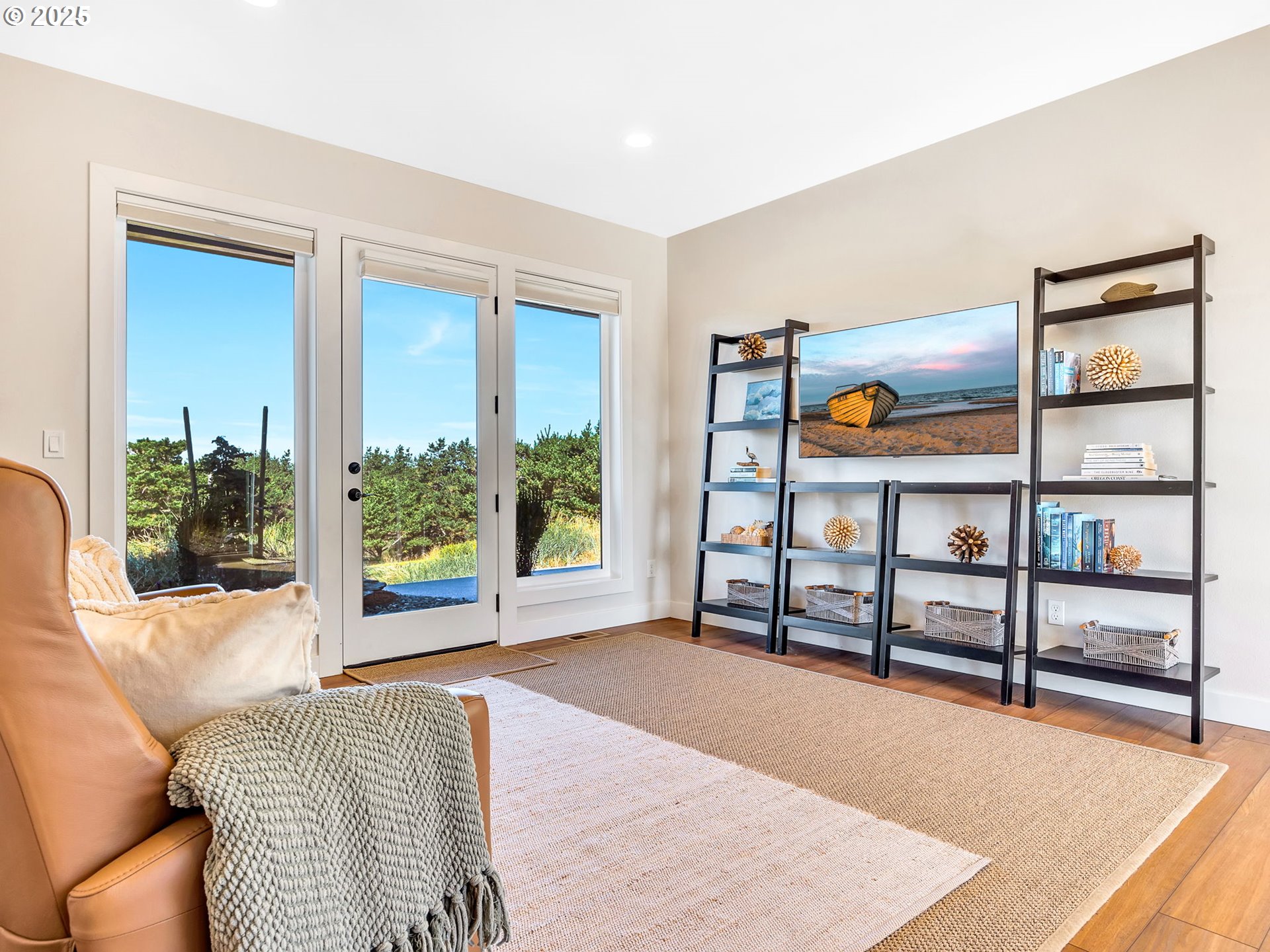 90043 Ocean Drive Warrenton, OR 97146 - Photo 33 of 48 a bedroom with furniture and a window