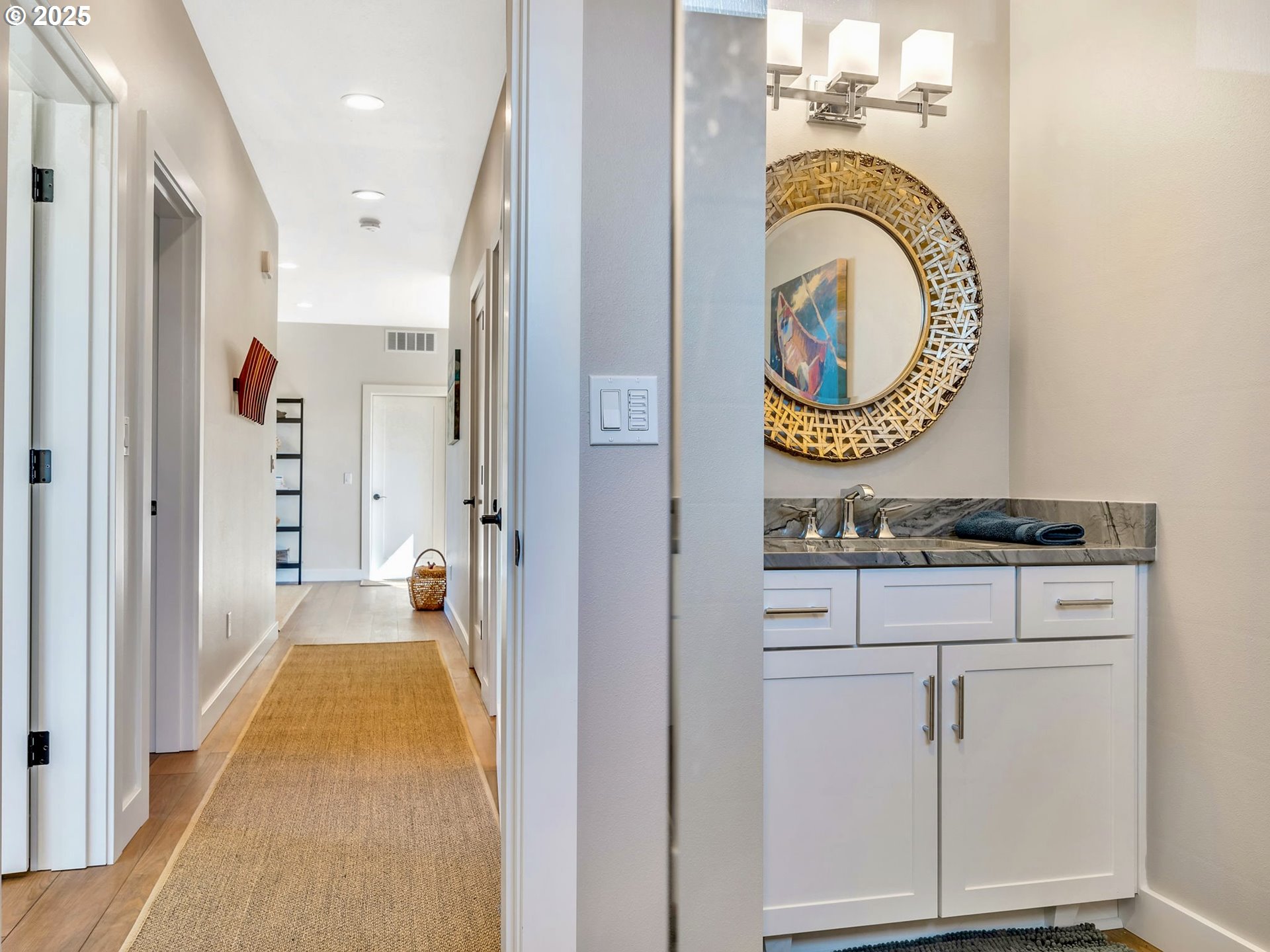 90043 Ocean Drive Warrenton, OR 97146 - Photo 36 of 48 a bathroom with a sink and a mirror