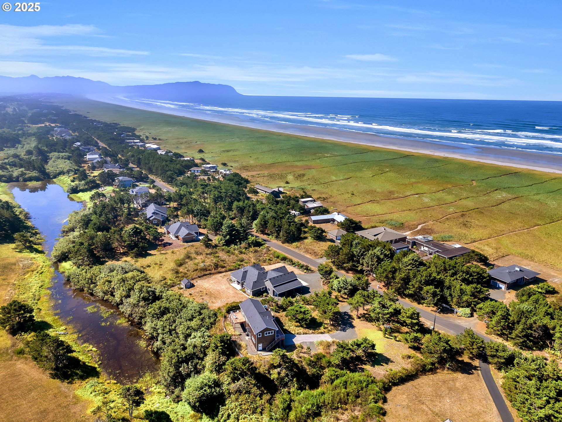 90043 Ocean Drive Warrenton, OR 97146 - Photo 4 of 48 a view of an ocean and beach