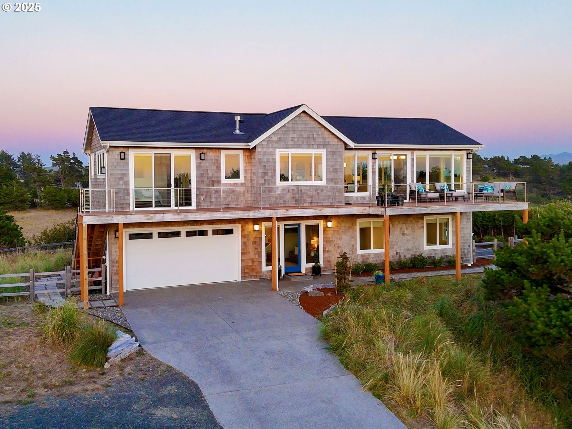 90043 Ocean Drive Warrenton, OR 97146 - Photo 44 of 48 a front view of a house with a yard
