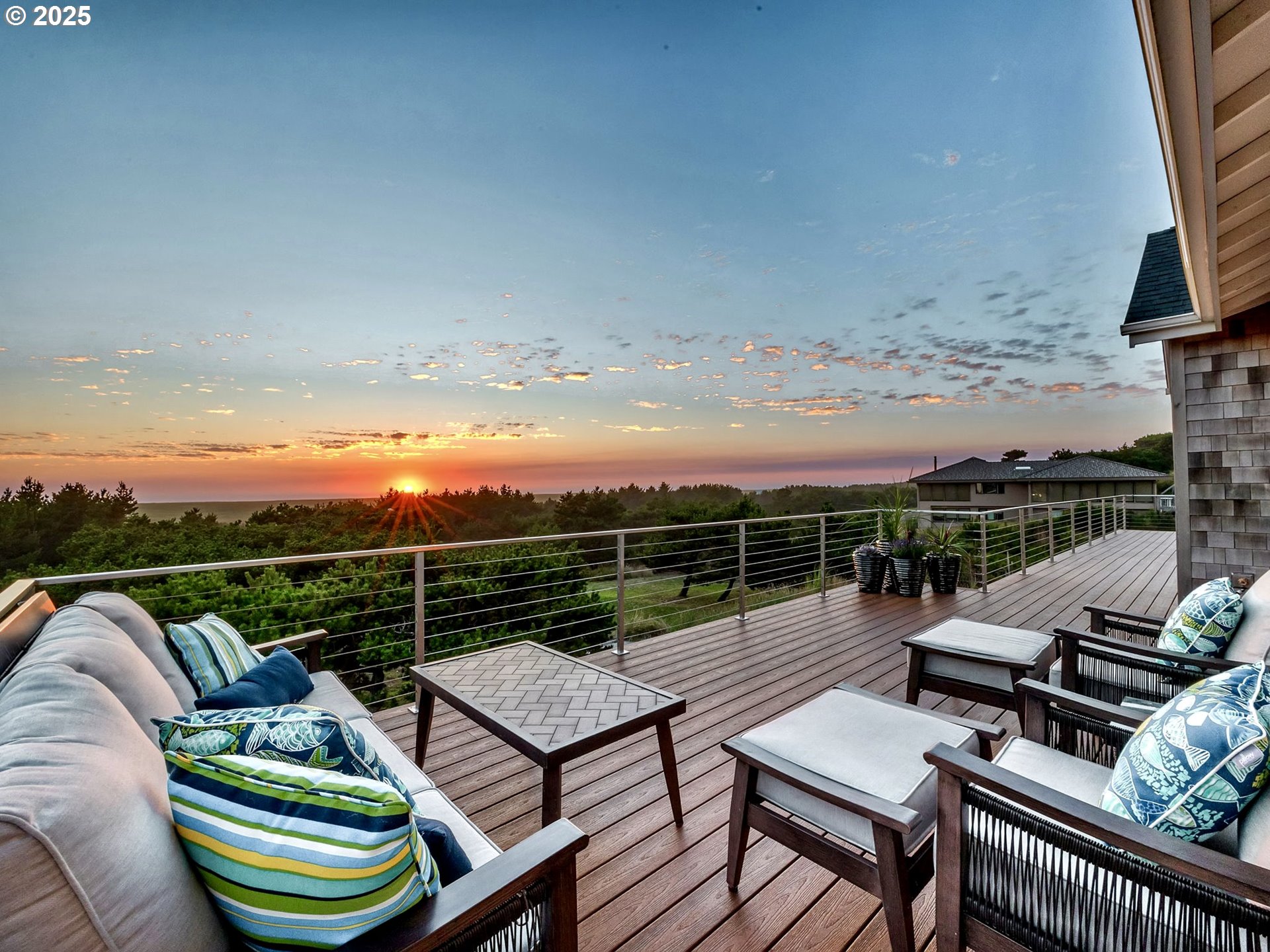 90043 Ocean Drive Warrenton, OR 97146 - Photo 46 of 48 a view of a roof deck with couches and wooden floor