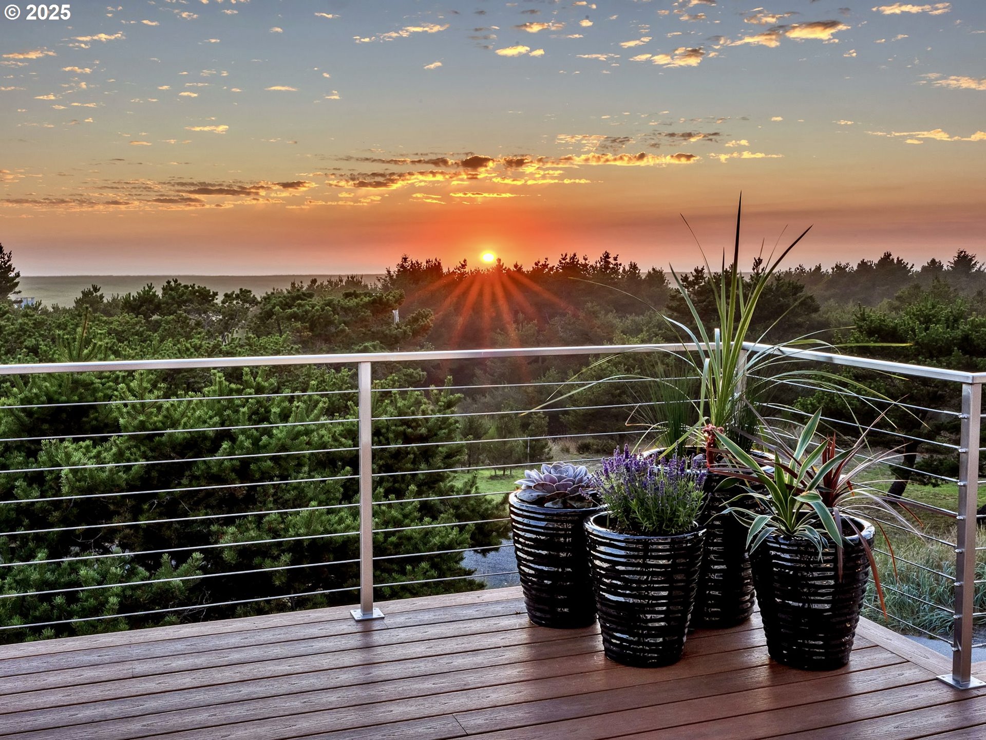 90043 Ocean Drive Warrenton, OR 97146 - Photo 47 of 48 a view of a chairs and table on the wooden roof deck