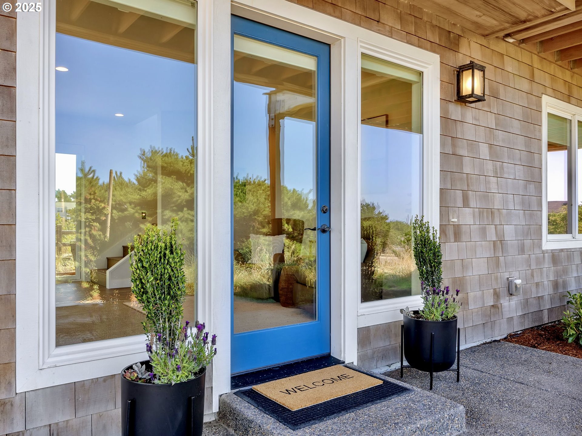 90043 Ocean Drive Warrenton, OR 97146 - Photo 6 of 48 a view of a entryway door front of house