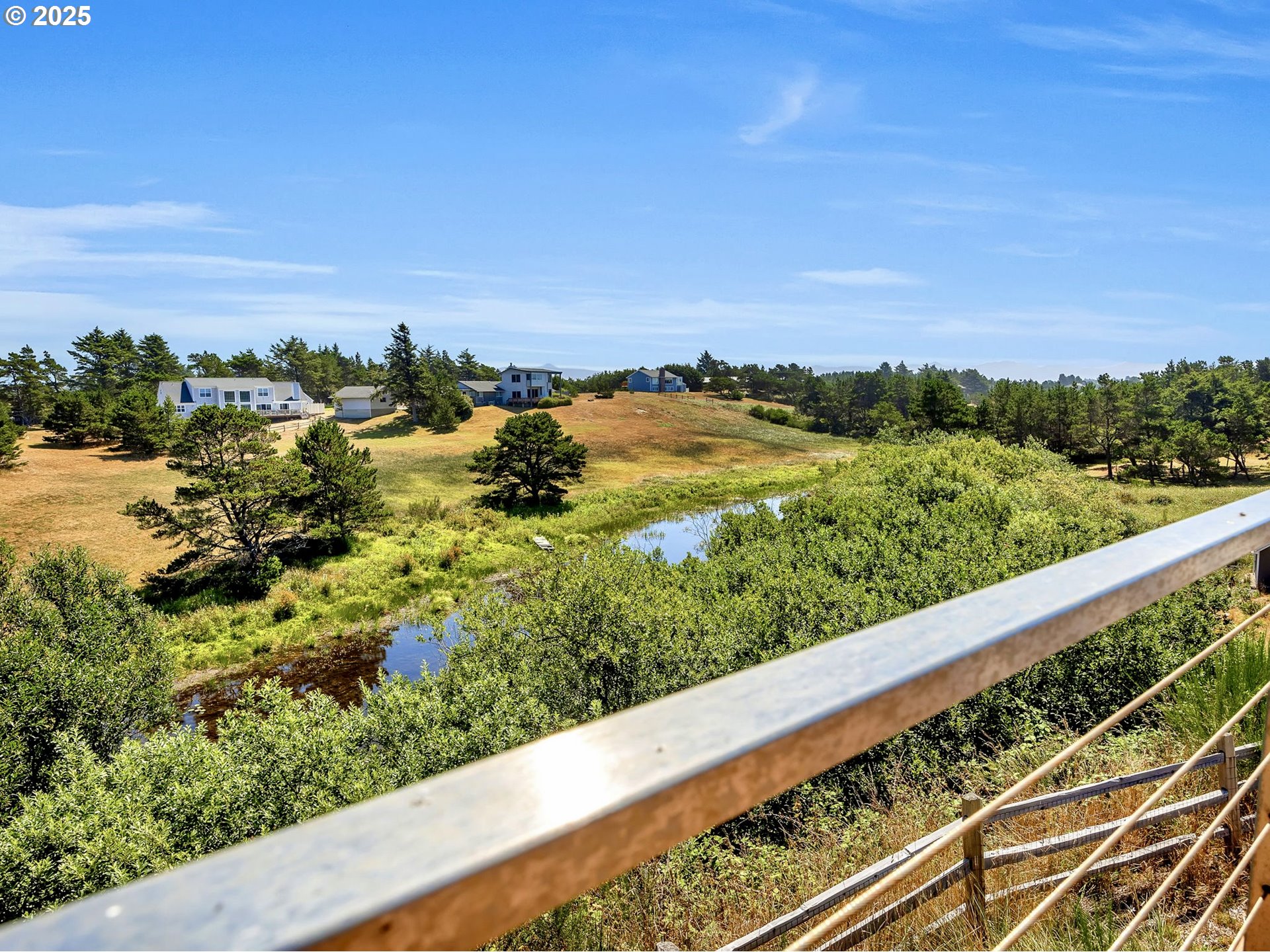 90043 Ocean Drive Warrenton, OR 97146 - Photo 10 of 48 a view of sky from a balcony