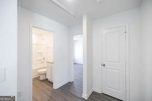 a kitchen with a stove and a microwave