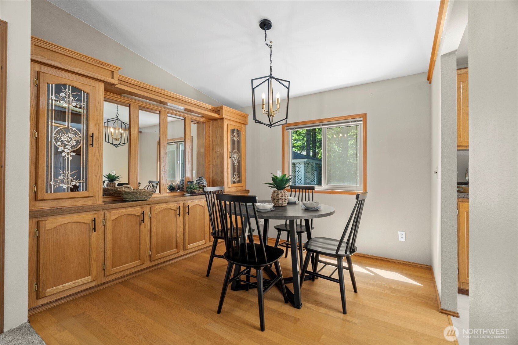 3758 Aiken Road Southeast Port Orchard, WA 98366 - Photo 11 of 40 a view of a dining room with furniture window and outside view