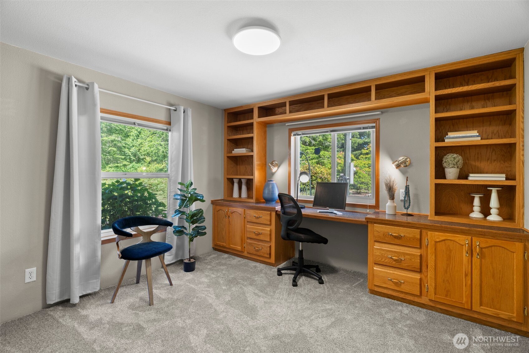 3758 Aiken Road Southeast Port Orchard, WA 98366 - Photo 18 of 40 a view of a livingroom with workspace and a window
