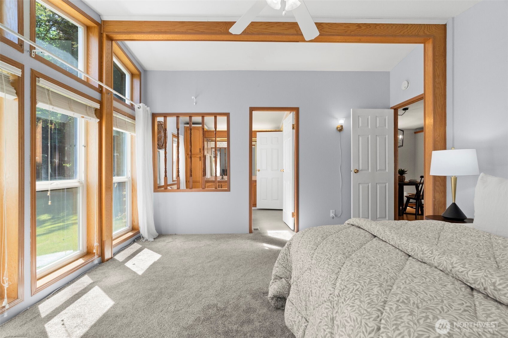 3758 Aiken Road Southeast Port Orchard, WA 98366 - Photo 21 of 40 a bedroom with a bed and a large window
