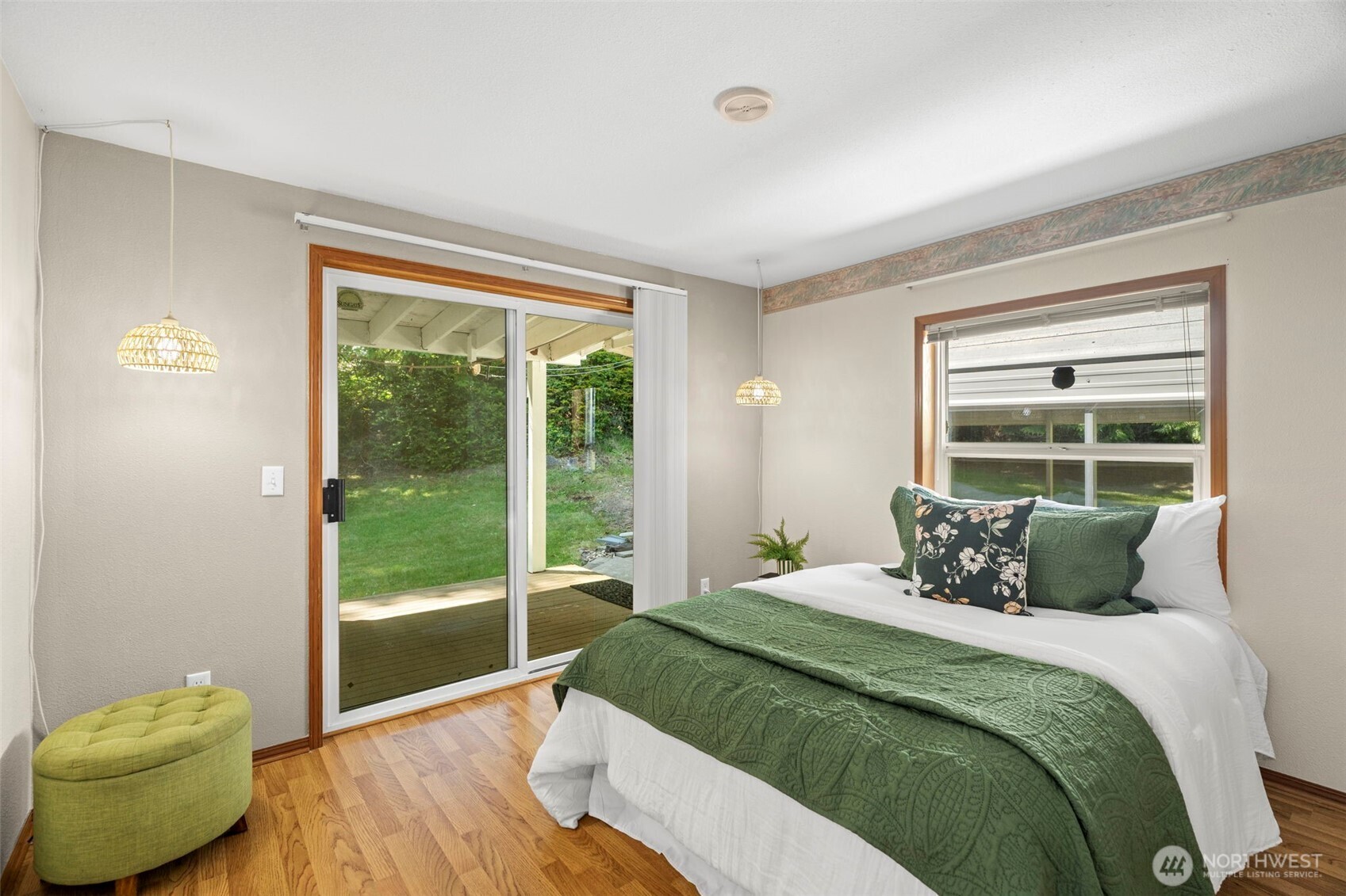 3758 Aiken Road Southeast Port Orchard, WA 98366 - Photo 22 of 40 a bedroom with a bed and a window