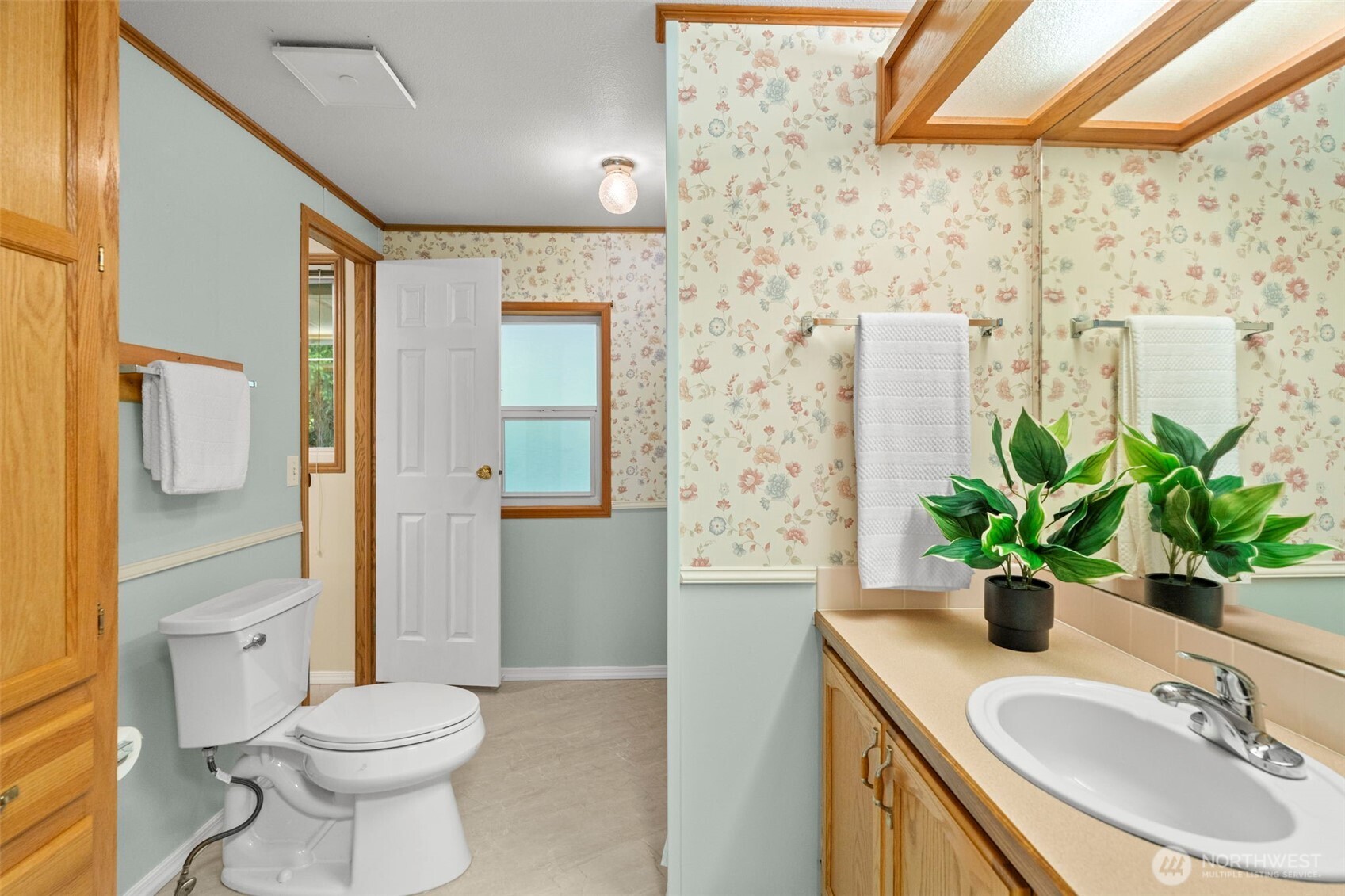 3758 Aiken Road Southeast Port Orchard, WA 98366 - Photo 25 of 40 a bathroom with a sink toilet and shower