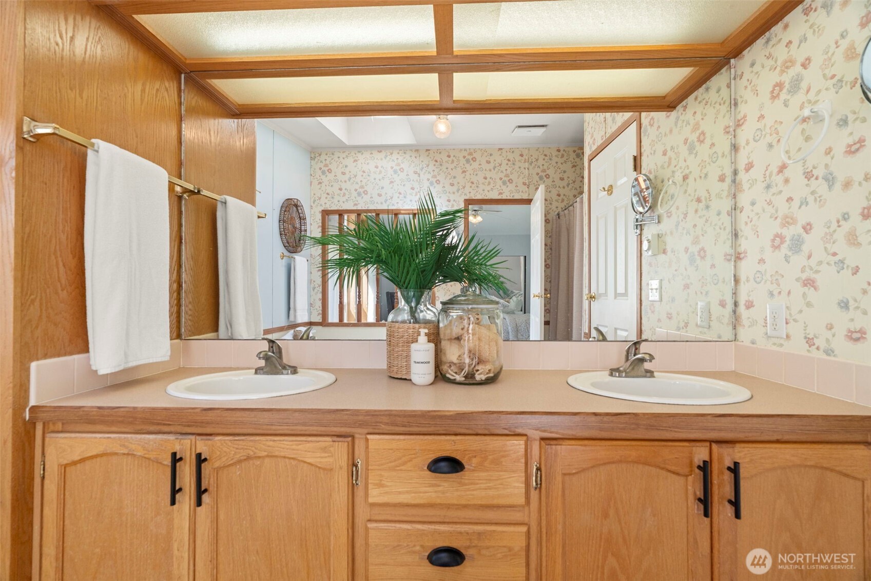 3758 Aiken Road Southeast Port Orchard, WA 98366 - Photo 26 of 40 a bathroom with a double vanity sink and a mirror