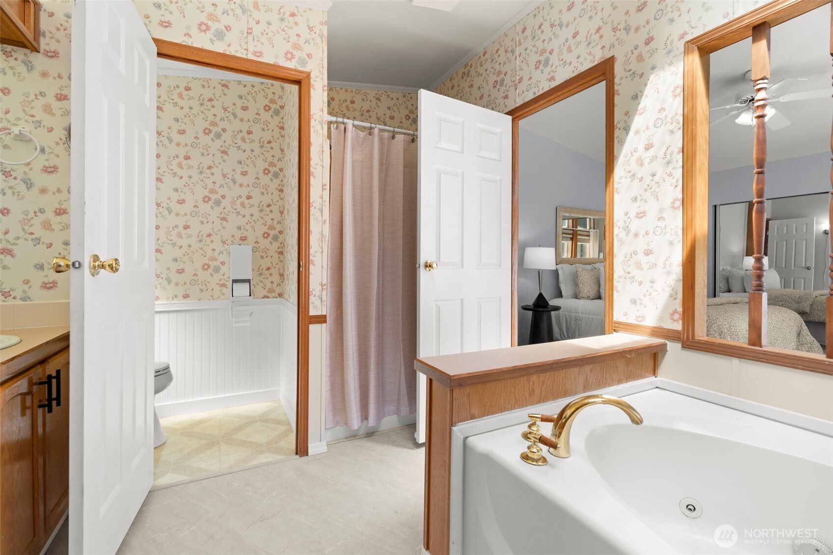 3758 Aiken Road Southeast Port Orchard, WA 98366 - Photo 28 of 40 a bathroom with a tub sink and shower