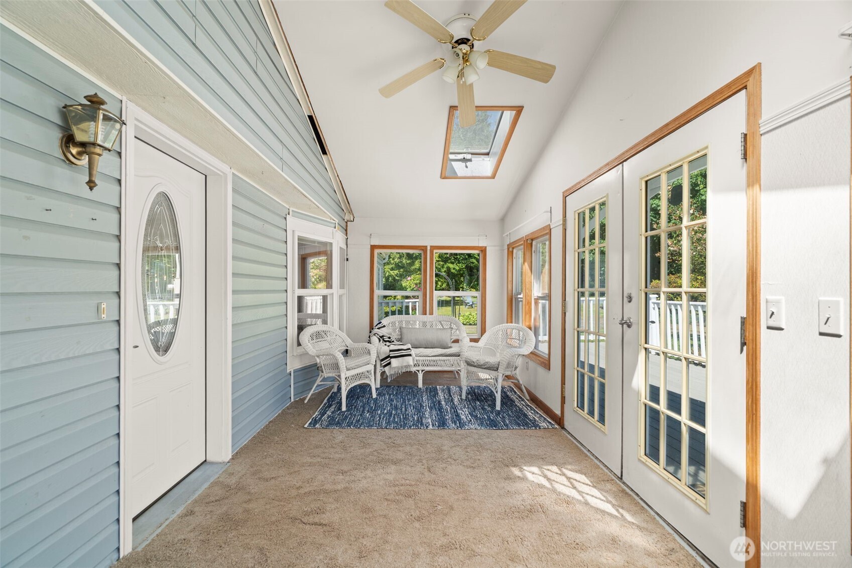 3758 Aiken Road Southeast Port Orchard, WA 98366 - Photo 8 of 40 a view of a hallway with wooden floor and furniture