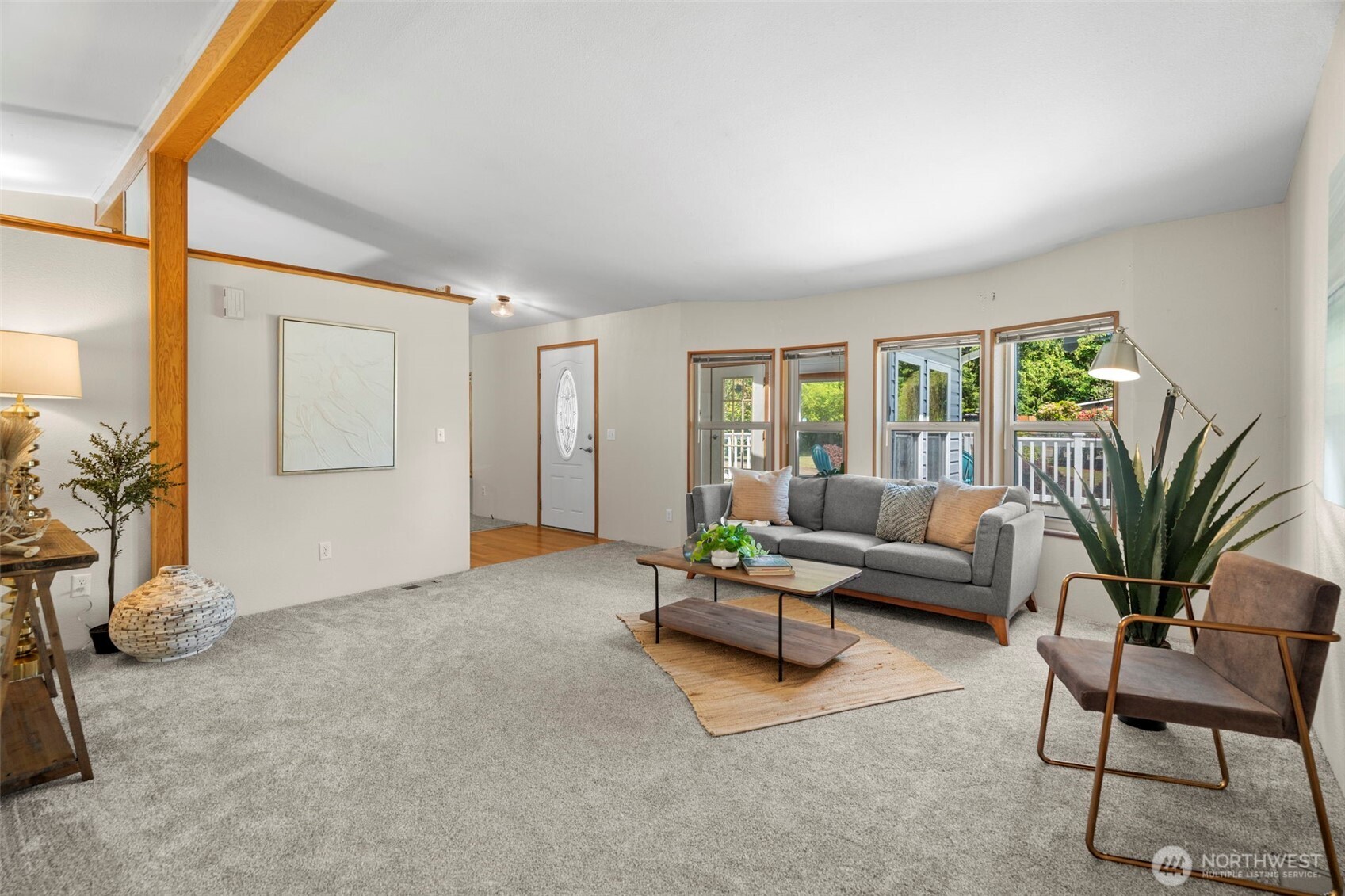 3758 Aiken Road Southeast Port Orchard, WA 98366 - Photo 9 of 40 a living room with furniture and a large window