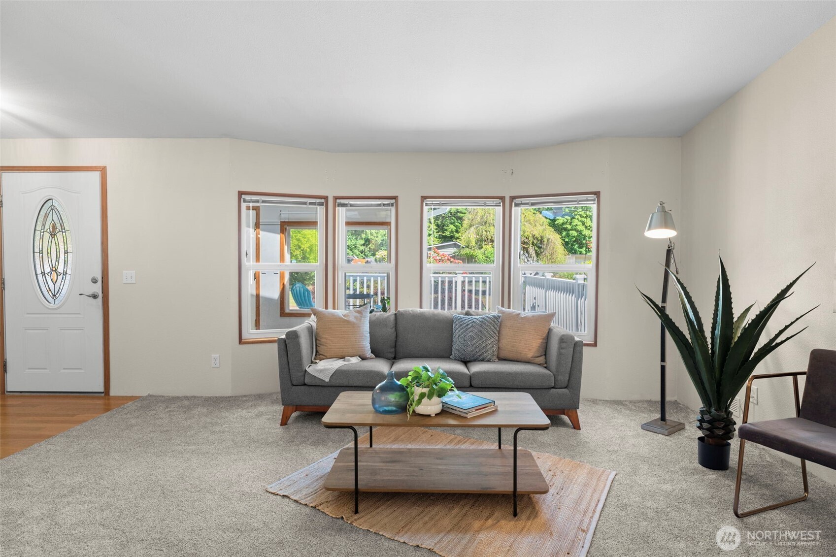 3758 Aiken Road Southeast Port Orchard, WA 98366 - Photo 10 of 40 a living room with furniture and a large window