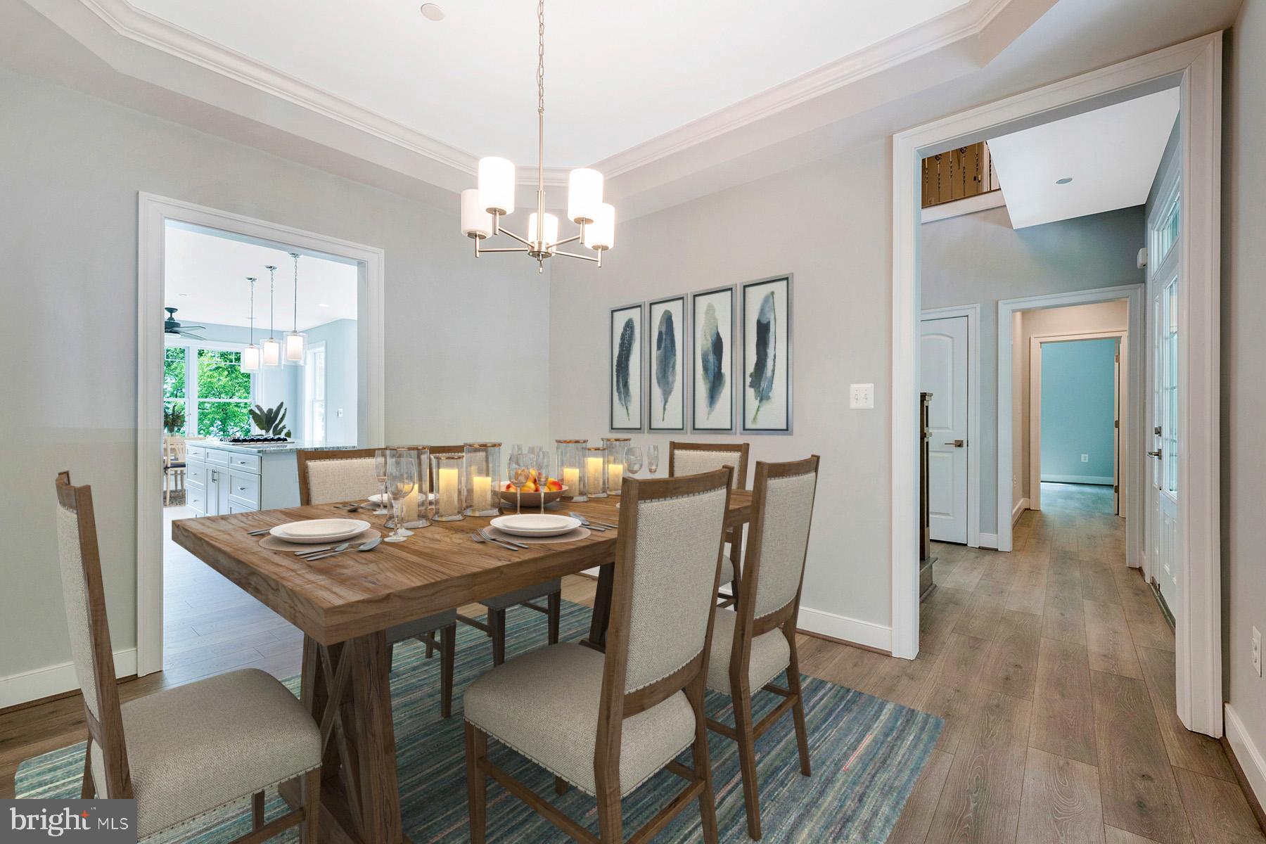489 Edgewater Road Pasadena, MD 21122 - Photo 11 of 24 Formal dining room has wood floors