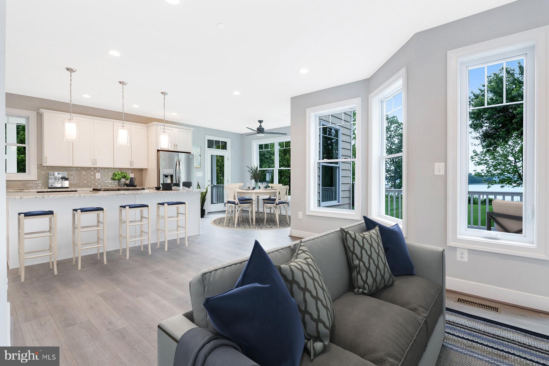 Great room flows into the kitchen: water views