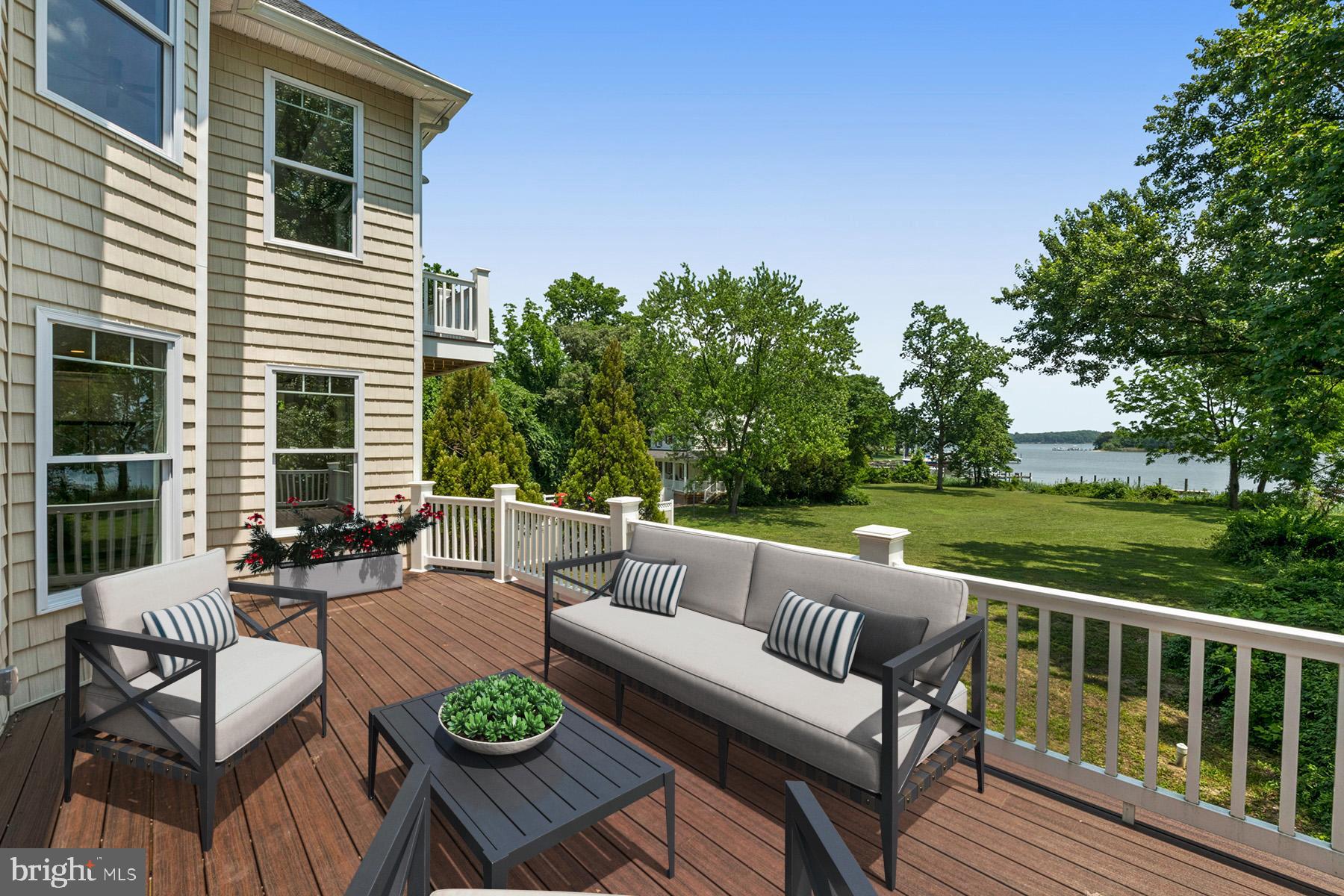 489 Edgewater Road Pasadena, MD 21122 - Photo 10 of 24 Spacious deck off the great room has water views