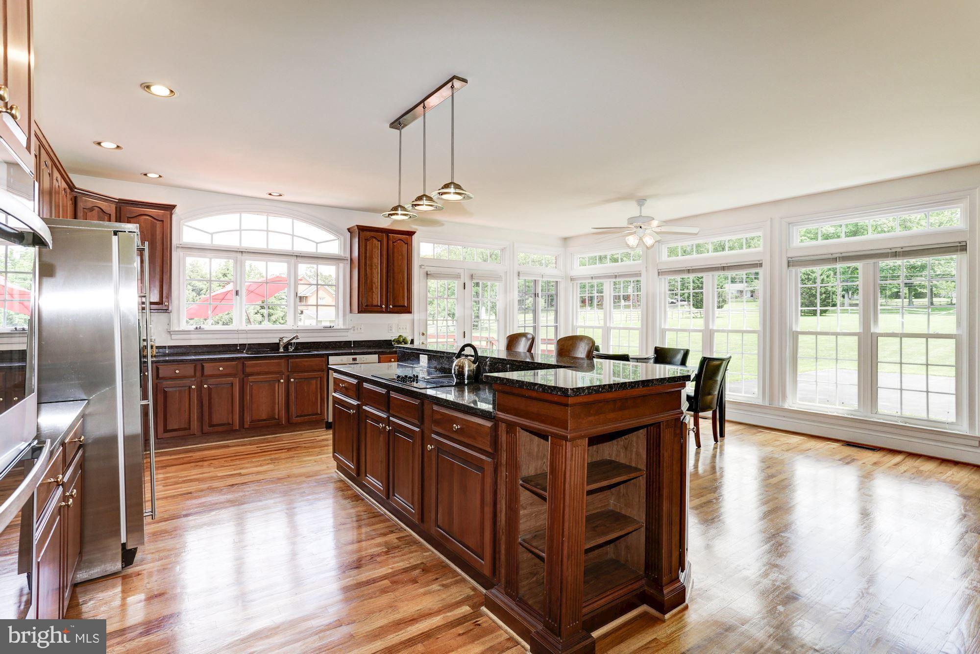 5901 Granby Road Derwood, MD 20855 - Photo 19 of 50 ISLAND COOKING AND BAR SEATING