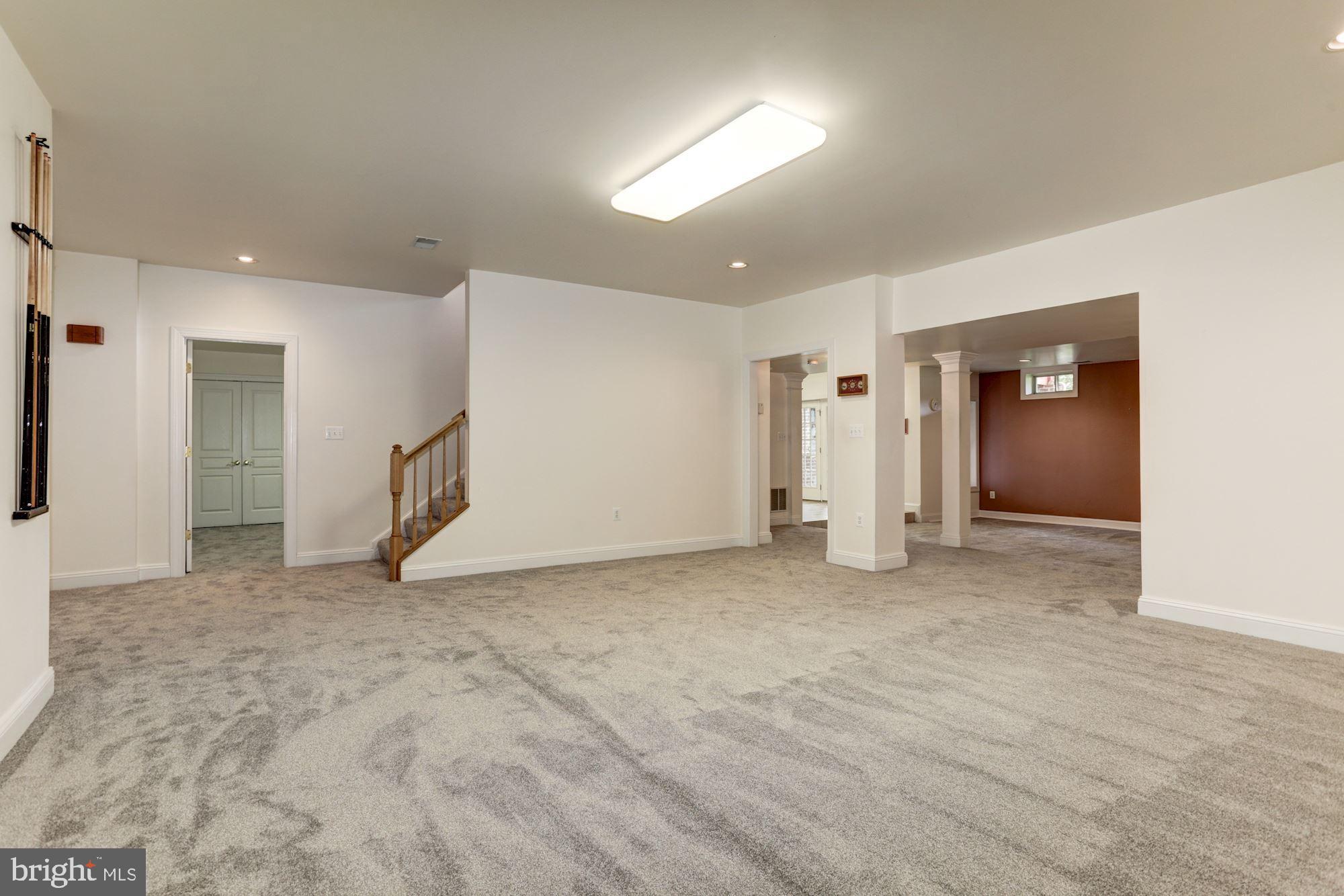 5901 Granby Road Derwood, MD 20855 - Photo 35 of 50 EXPANSIVE LOWER LEVEL RECREATION ROOM