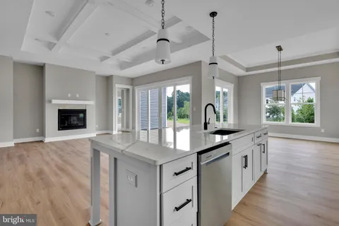 a kitchen with sink and window