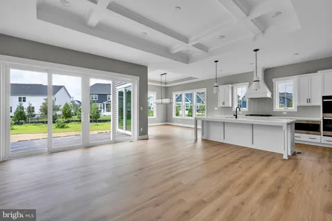 a view of kitchen with cabinets and outdoor view