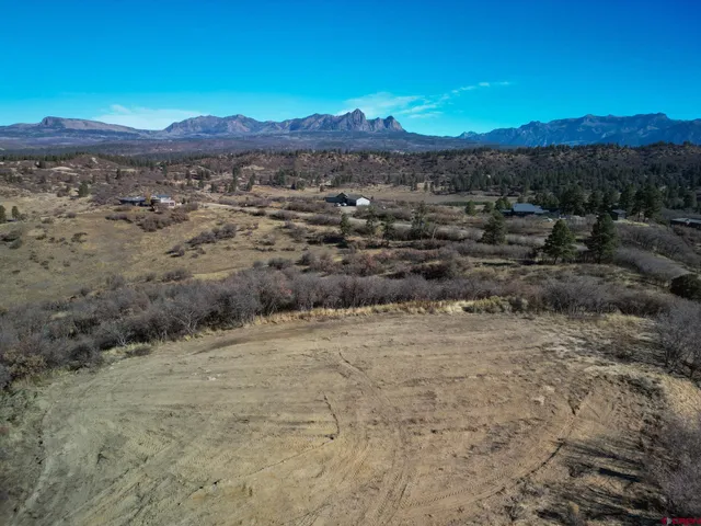 a view of a lake with mountains in the background