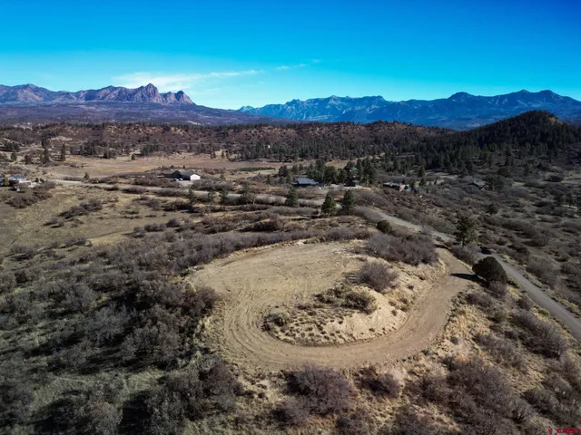 a view of a house with a mountain
