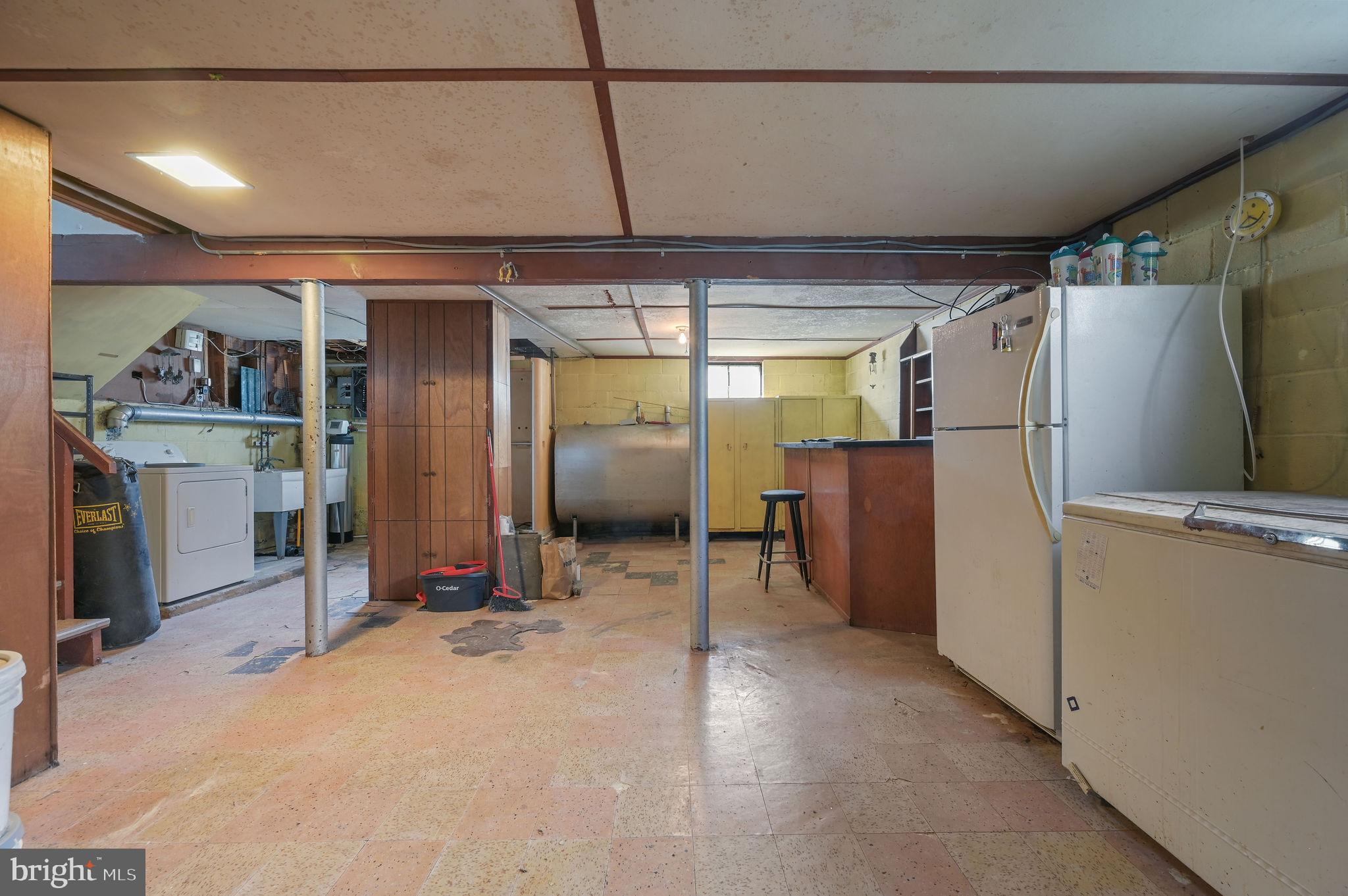 908 South Cass Street Middletown, DE 19709 - Photo 28 of 28 a view of a refrigerator in kitchen and empty room