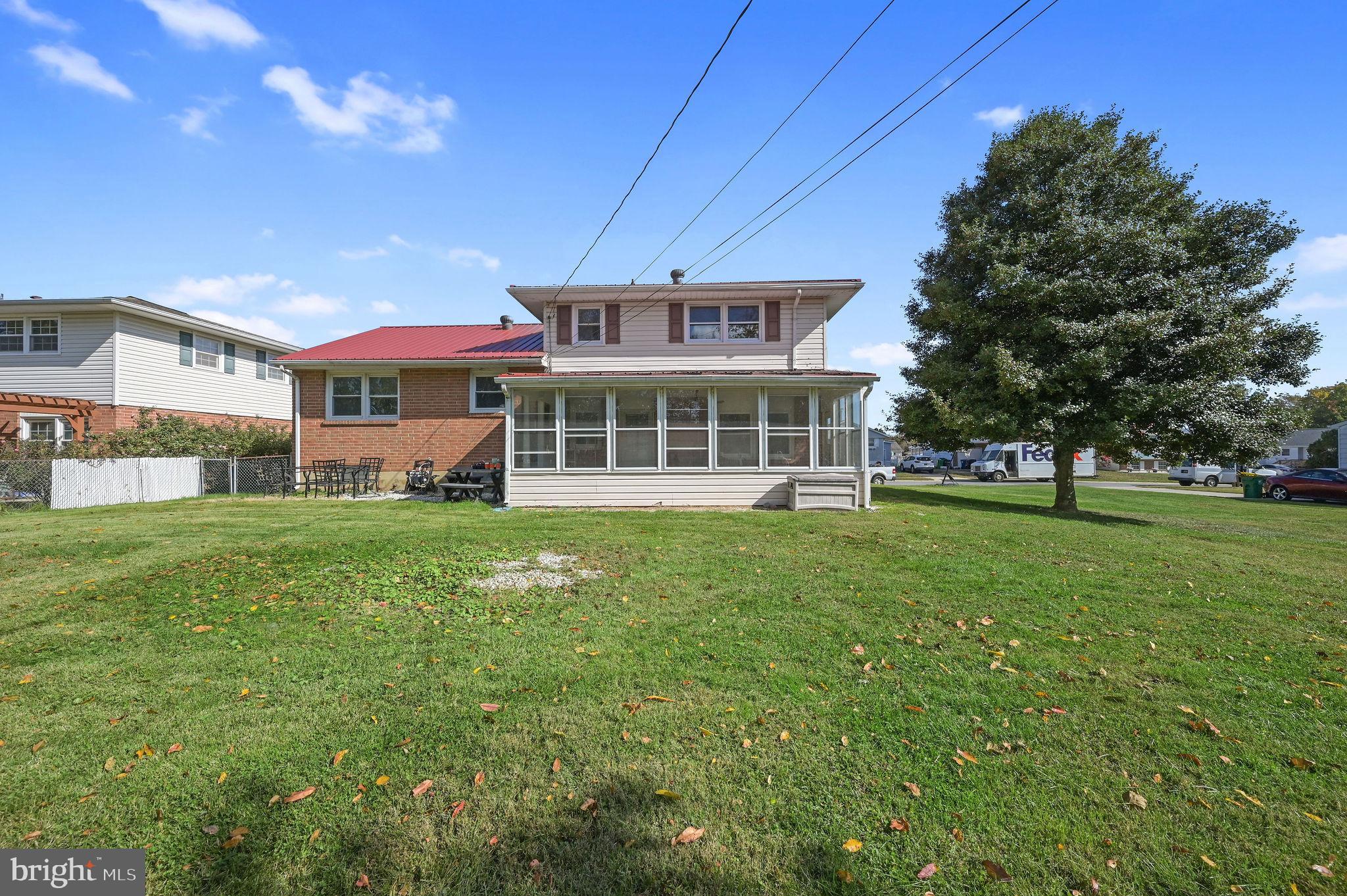 908 South Cass Street Middletown, DE 19709 - Photo 5 of 28 a front view of a house with a garden
