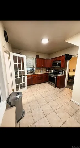 a view of a living room and a kitchen area